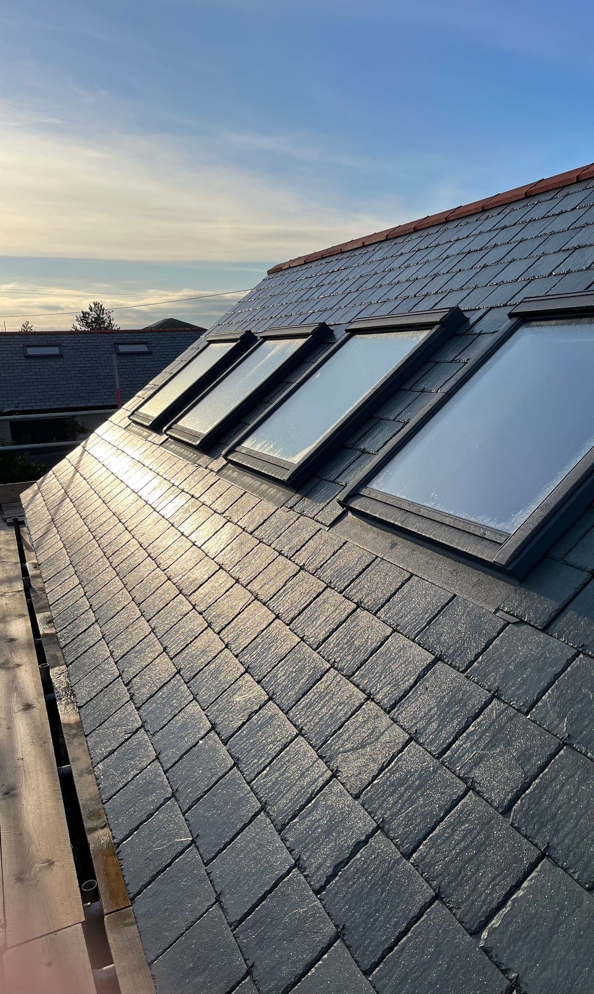 Slate roof with roof windows on a property in Newquay, Cornwall